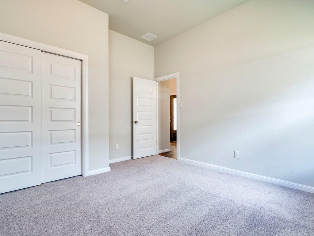 270 Rimrock Court Bastrop, TX 78602 - Photo 28 of 34 Secondary bedroom.