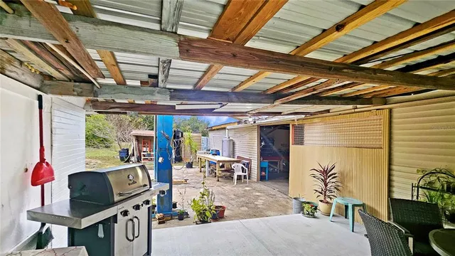 a view of a room with wooden furniture