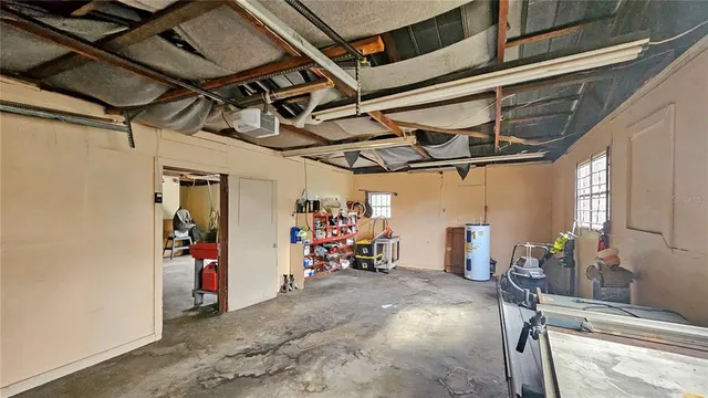 a house with green field in front of it