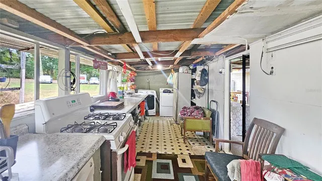 a view of a green field with clear sky