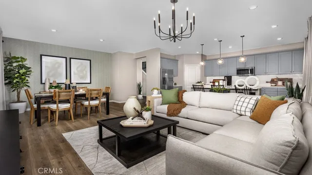 a view of a dining room with furniture and window