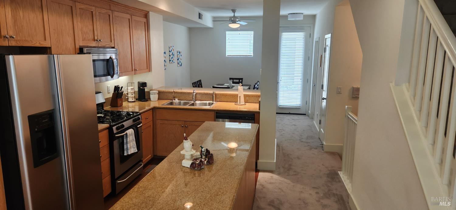 318 City Center Drive Rohnert Park, CA 94928 - Photo 4 of 8 a kitchen with refrigerator and window