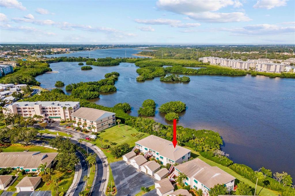 6555 99th Way North, Unit 20F St. Petersburg, FL 33708 - Photo 22 of 36 an aerial view of a city