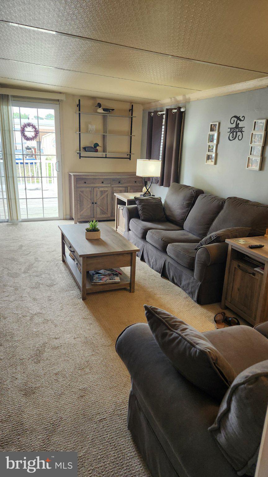 111 Beach Harbor Road, Unit 194C Grasonville, MD 21638 - Photo 24 of 24 Cozy living space with natural light.