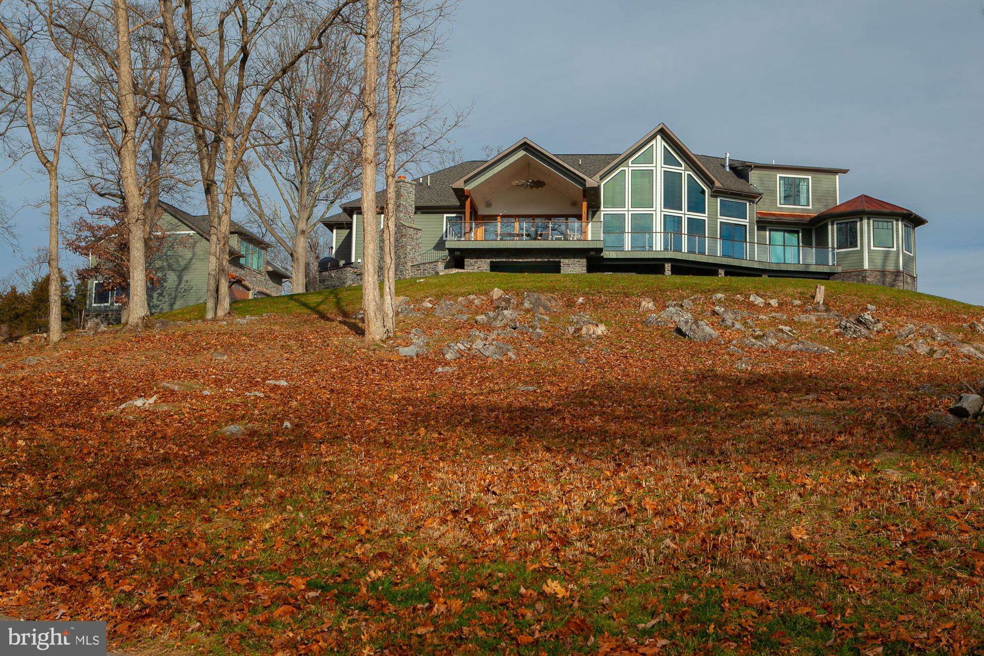 38 Whitings Neck Road, Unit POTOMAC OVERLOOK Martinsburg, WV 25404 - Photo 19 of 40 a view of a house with a yard