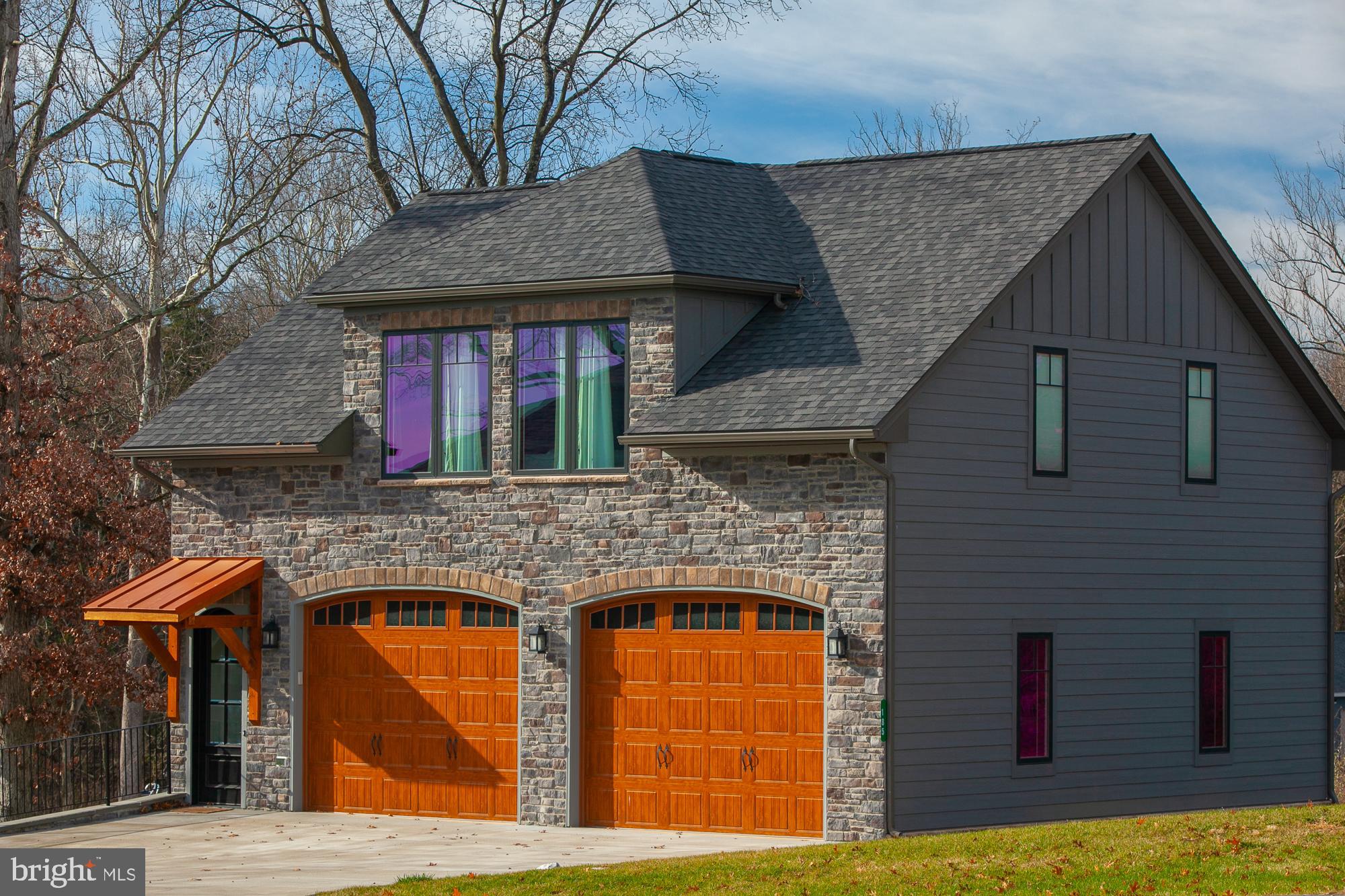38 Whitings Neck Road, Unit POTOMAC OVERLOOK Martinsburg, WV 25404 - Photo 21 of 40 a front view of house with yard