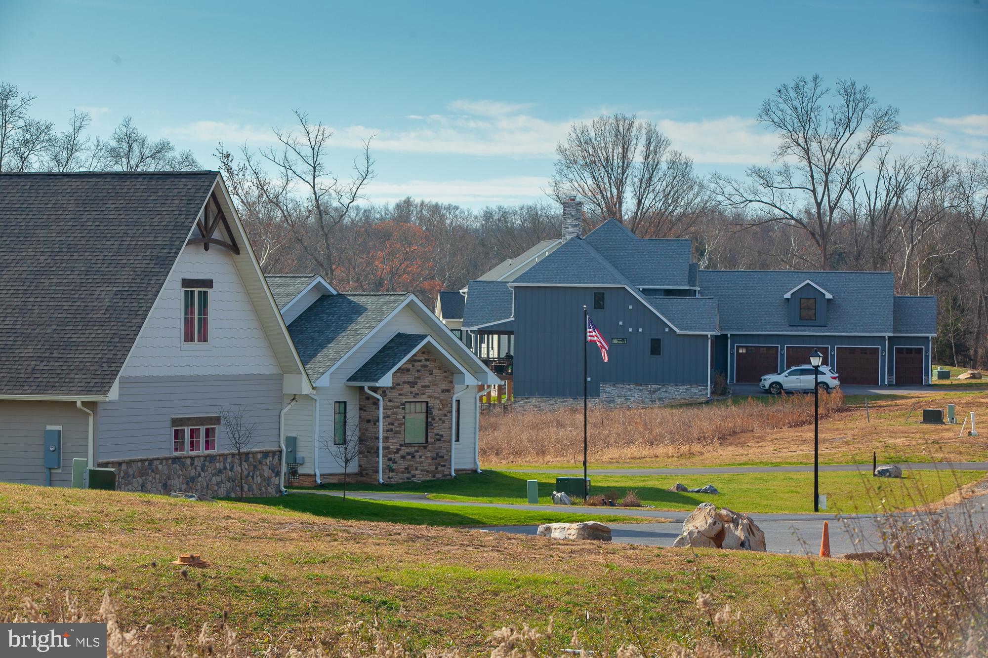 38 Whitings Neck Road, Unit POTOMAC OVERLOOK Martinsburg, WV 25404 - Photo 23 of 40 a front view of house with a yard