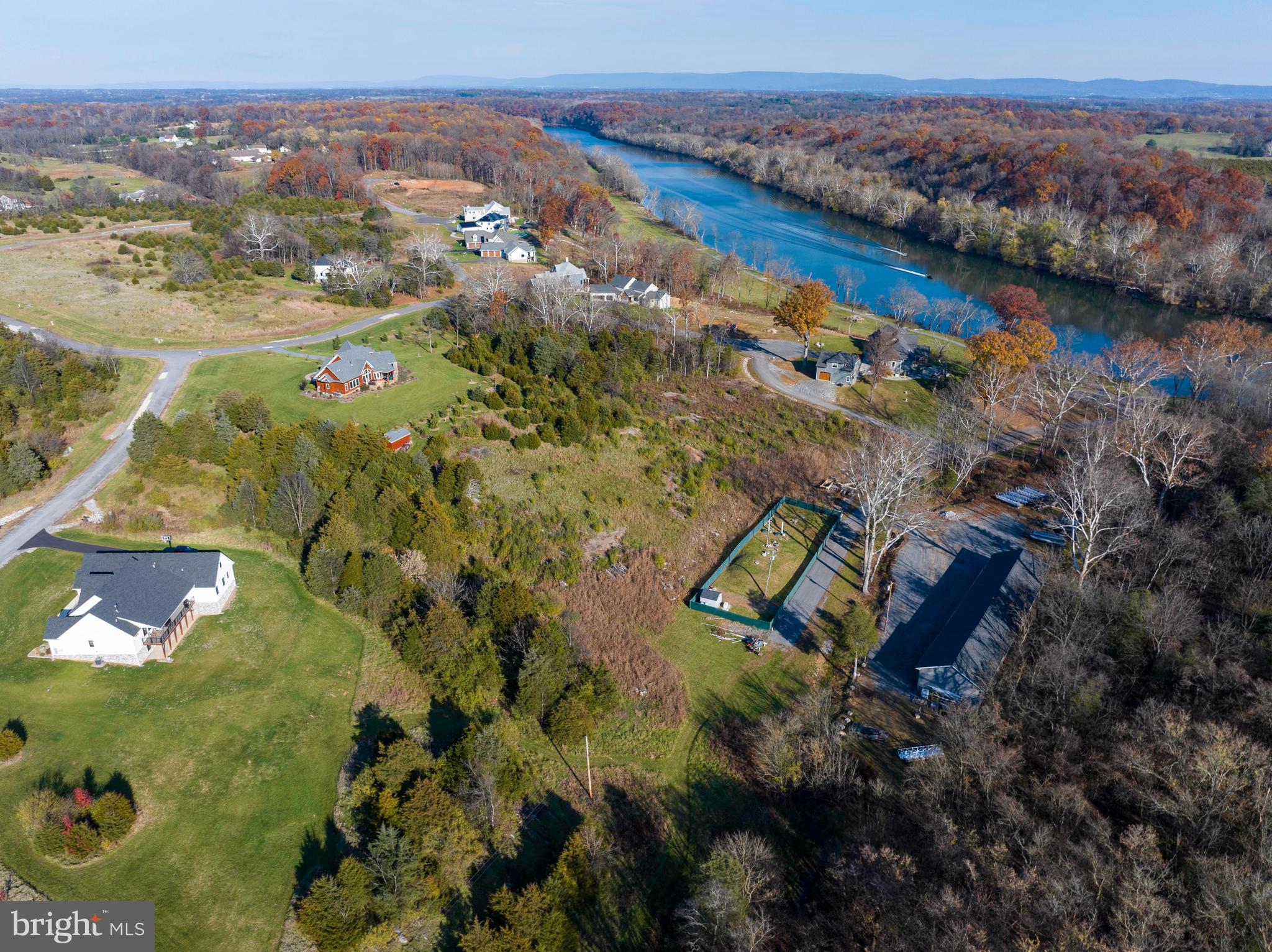 38 Whitings Neck Road, Unit POTOMAC OVERLOOK Martinsburg, WV 25404 - Photo 33 of 40 an aerial view of residential houses with outdoor space