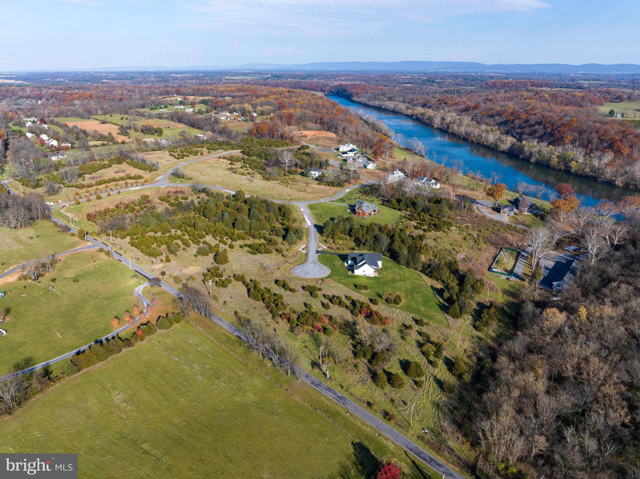 38 Whitings Neck Road, Unit POTOMAC OVERLOOK Martinsburg, WV 25404 - Photo 34 of 40 an aerial view of residential houses with outdoor space