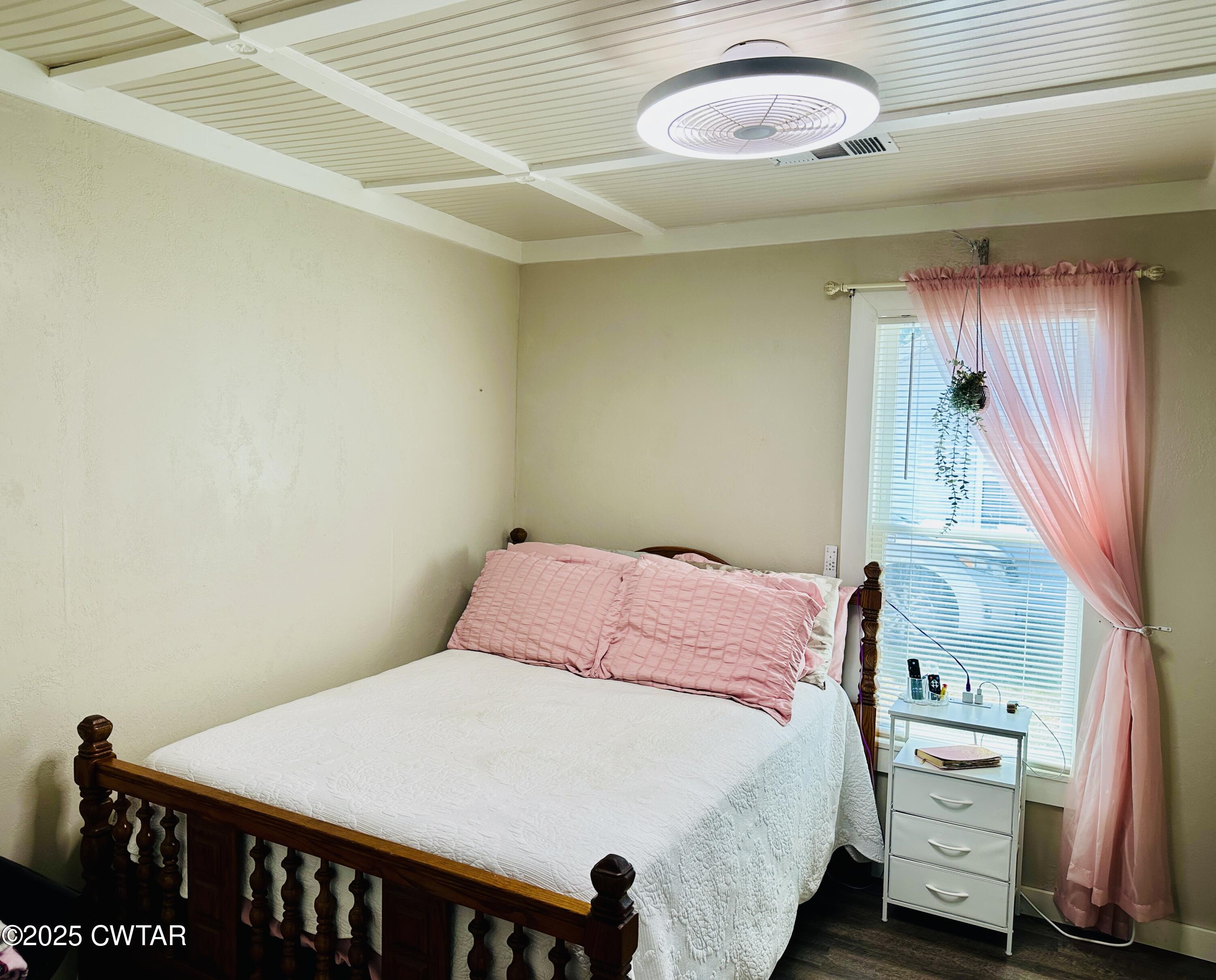 404 McKnight Street Rutherford, TN 38369 - Photo 14 of 33 a bedroom with a bed and a window