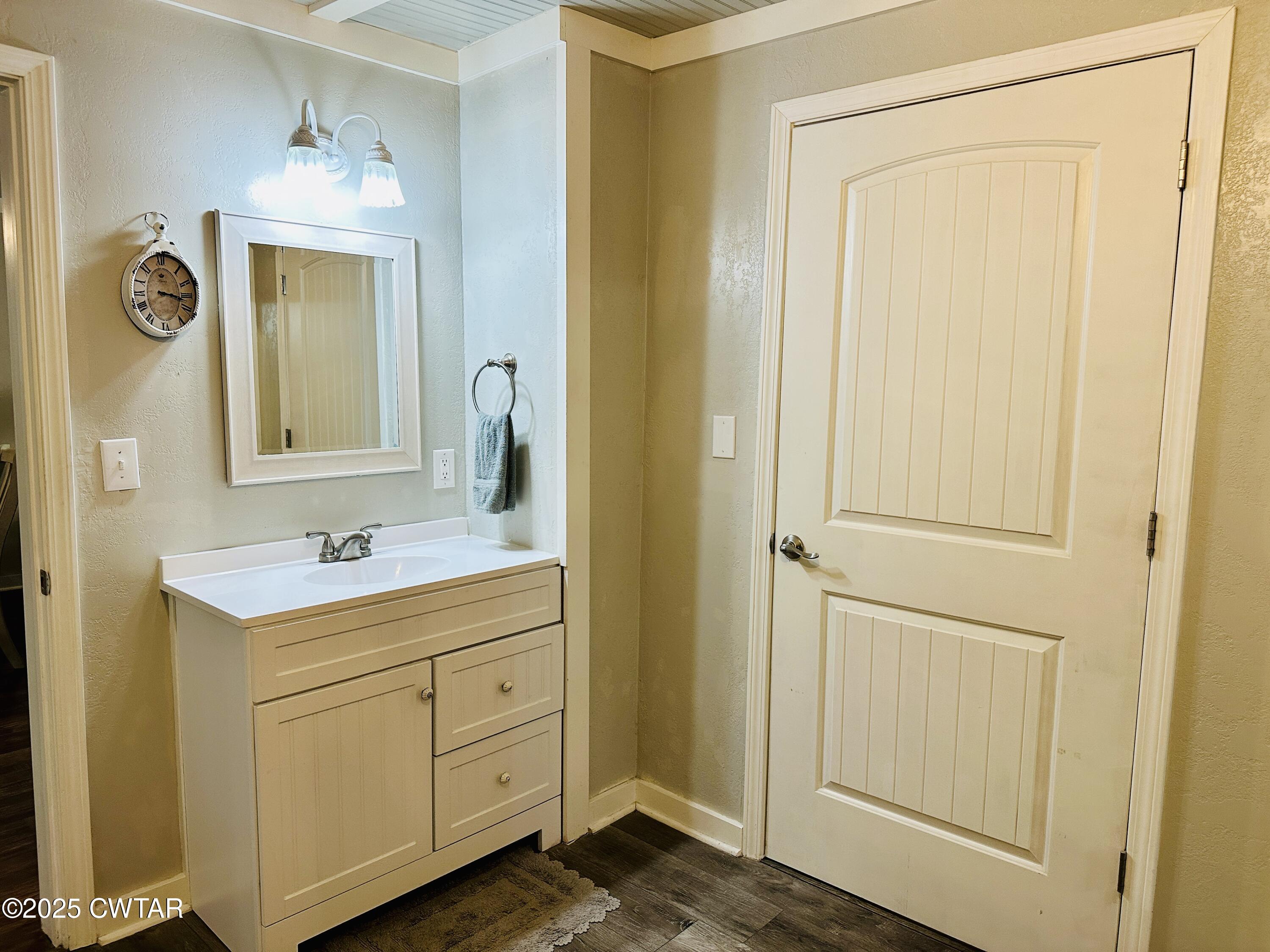 404 McKnight Street Rutherford, TN 38369 - Photo 17 of 33 a bathroom with a sink and a mirror