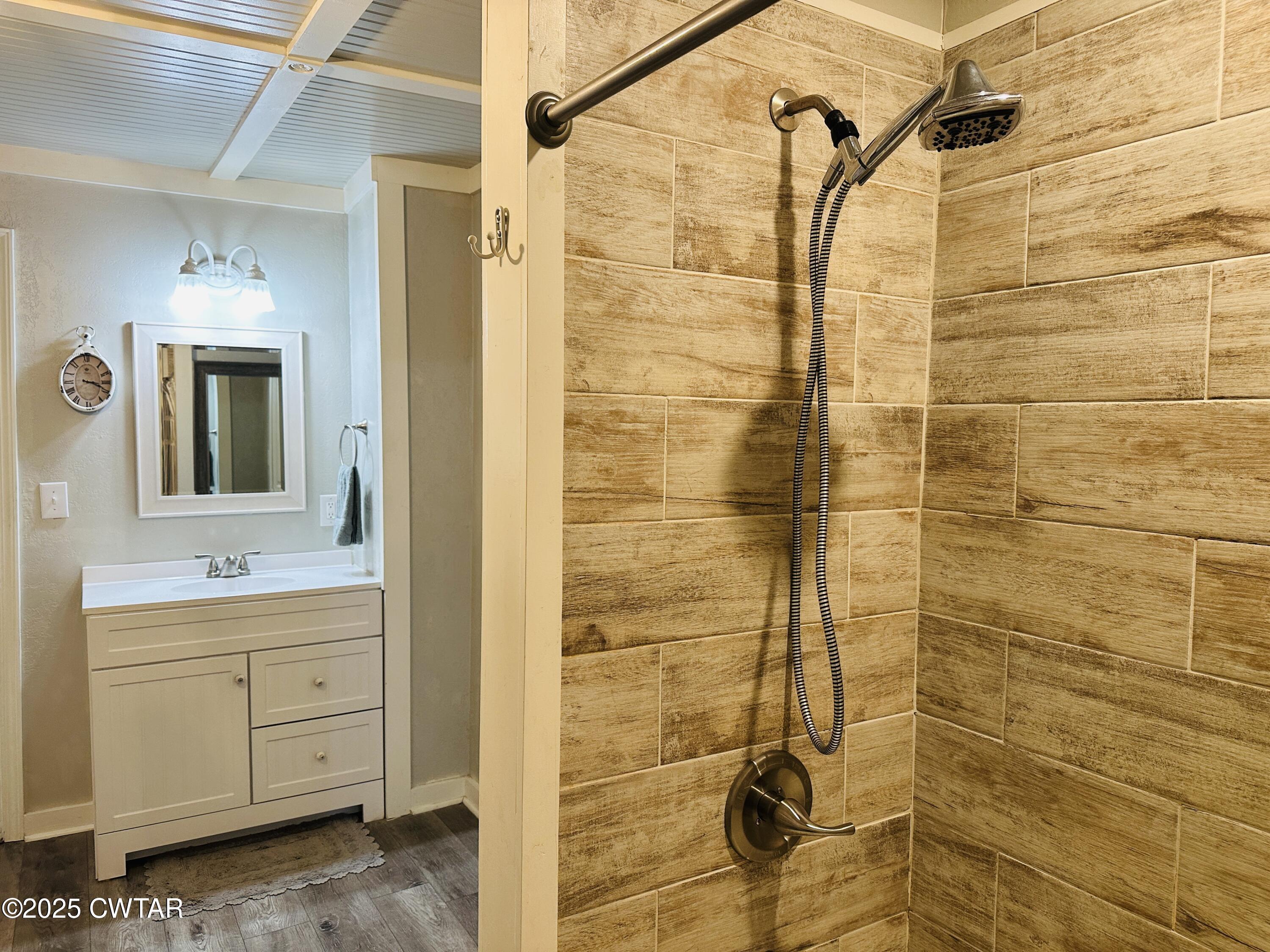 404 McKnight Street Rutherford, TN 38369 - Photo 18 of 33 a bathroom with a shower and a sink
