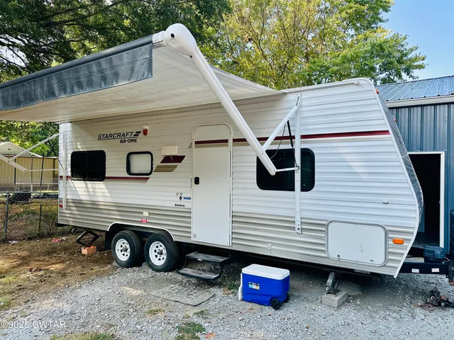 a backyard of a house with seating space