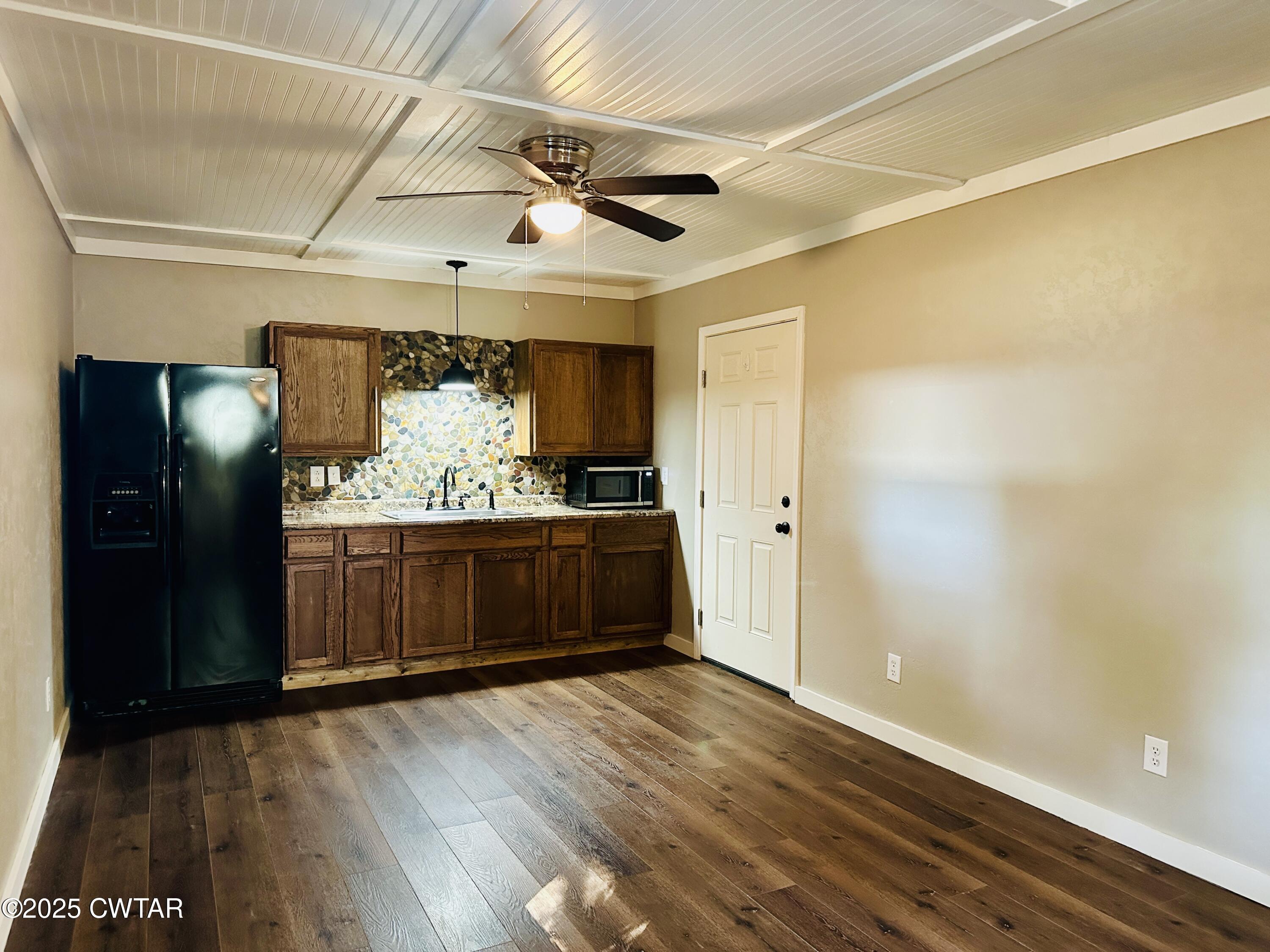 404 McKnight Street Rutherford, TN 38369 - Photo 29 of 33 a view of room with window and wooden floor