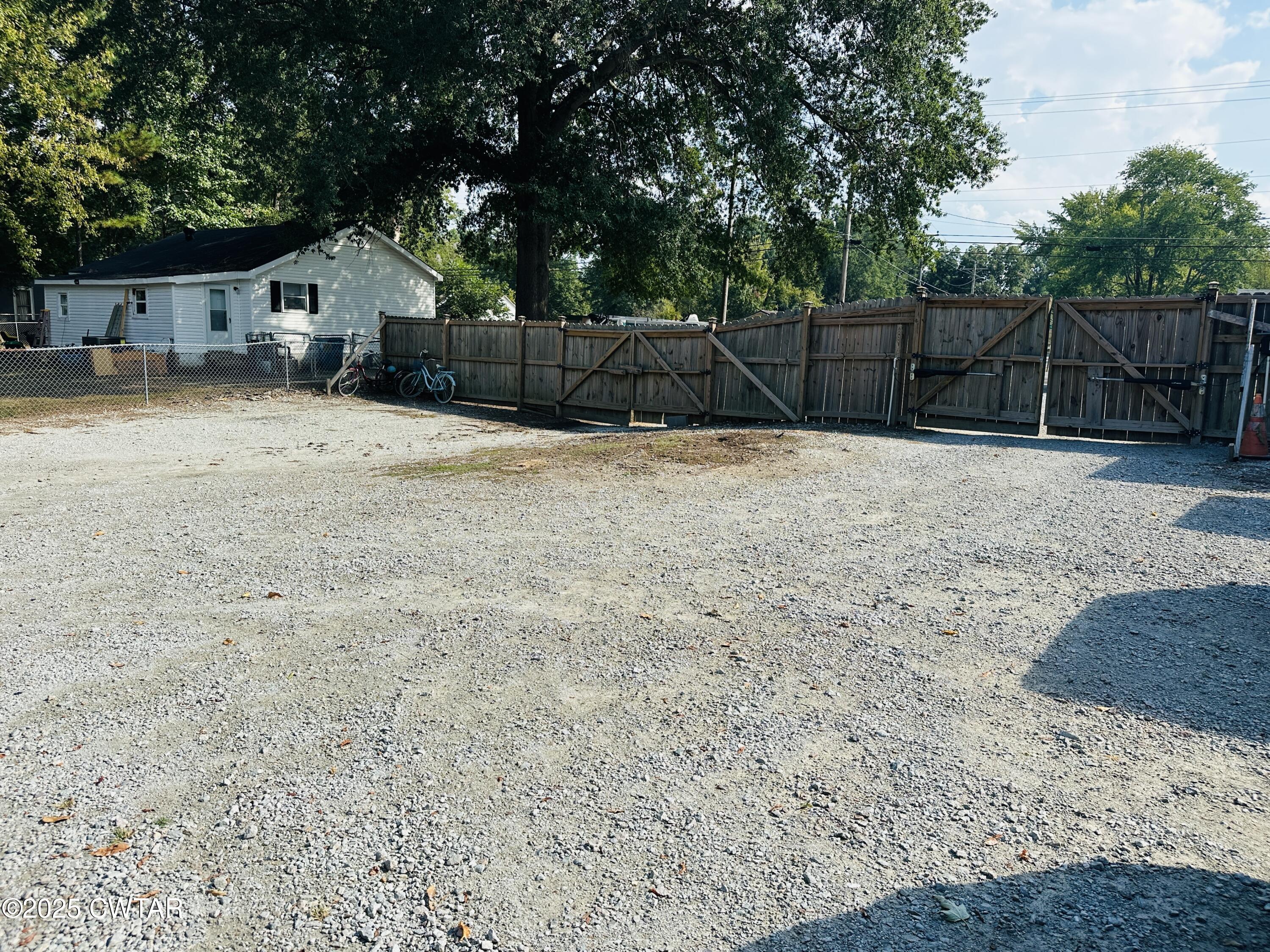 404 McKnight Street Rutherford, TN 38369 - Photo 3 of 33 a front view of a house with a yard and garage