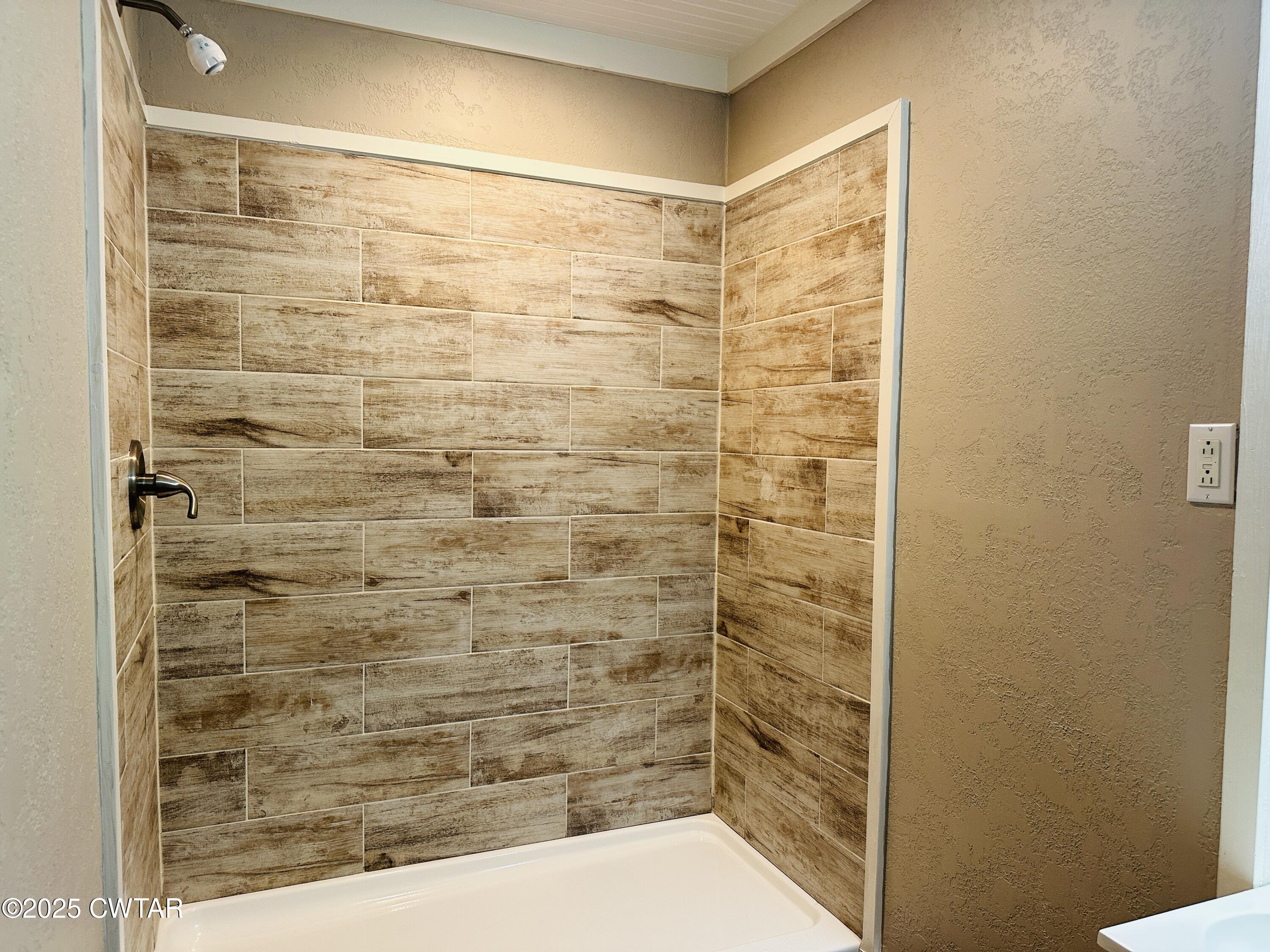 404 McKnight Street Rutherford, TN 38369 - Photo 32 of 33 a bathroom with a shower