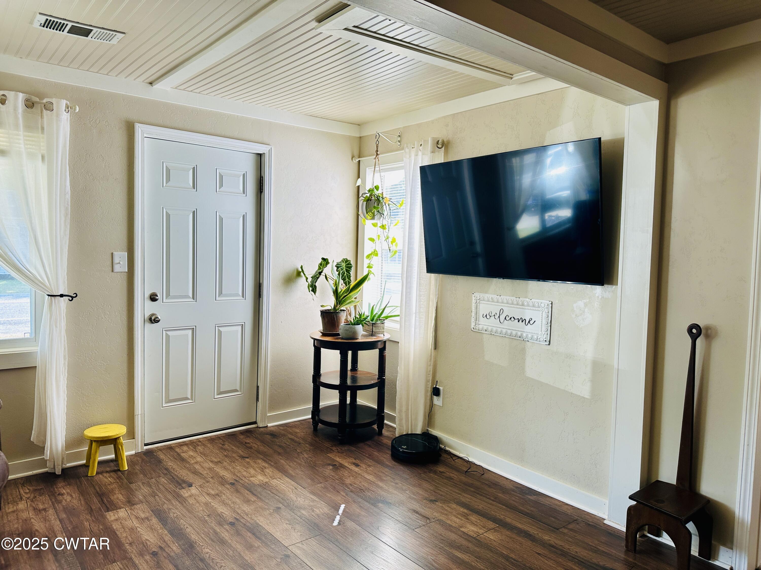 404 McKnight Street Rutherford, TN 38369 - Photo 8 of 33 a view of livingroom with hardwood floor and hallway