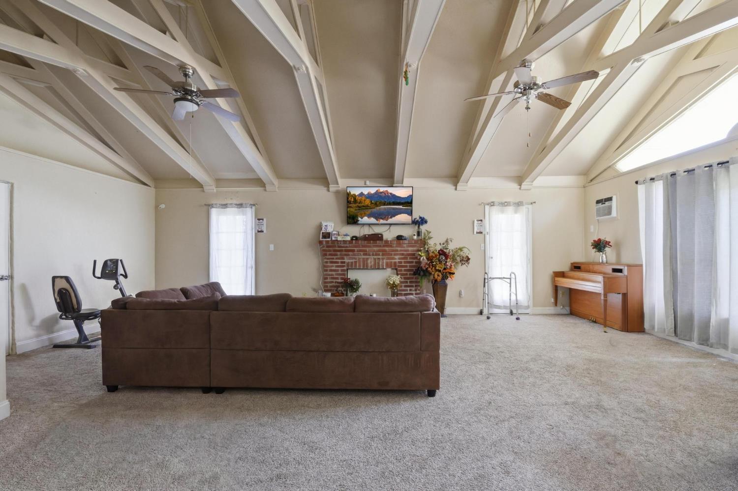 920 Bogue Road Yuba City, CA 95991 - Photo 12 of 26 Beautiful, vaulted ceilings outdoor access from each side of the family room