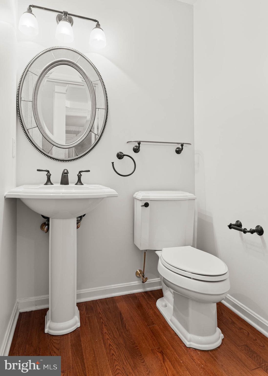 302 Arthur Court Newtown Square, PA 19073 - Photo 26 of 57 Powder room on first floor.