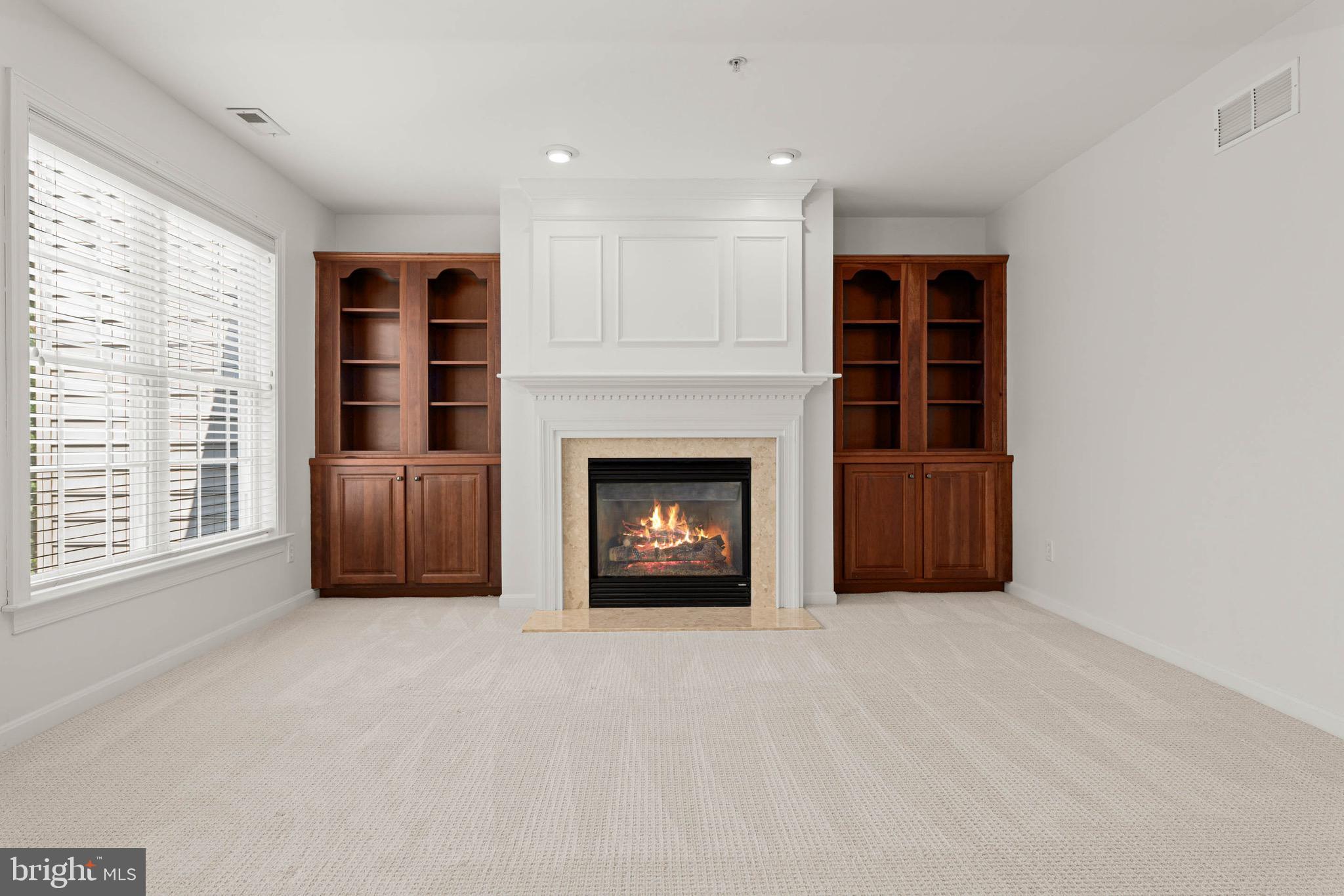 302 Arthur Court Newtown Square, PA 19073 - Photo 31 of 57 Sitting area w/ fireplace and built-ins.