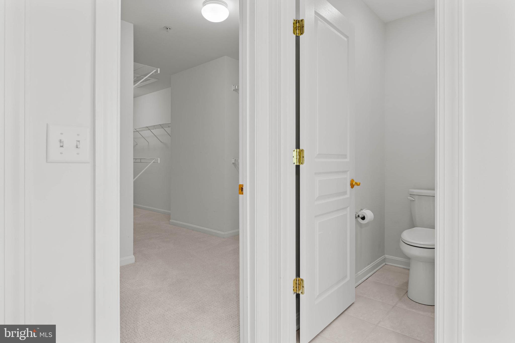 302 Arthur Court Newtown Square, PA 19073 - Photo 37 of 57 Private toilet and walk-in closet.