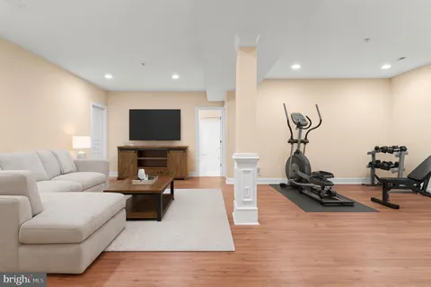 a view of deck with a large trees