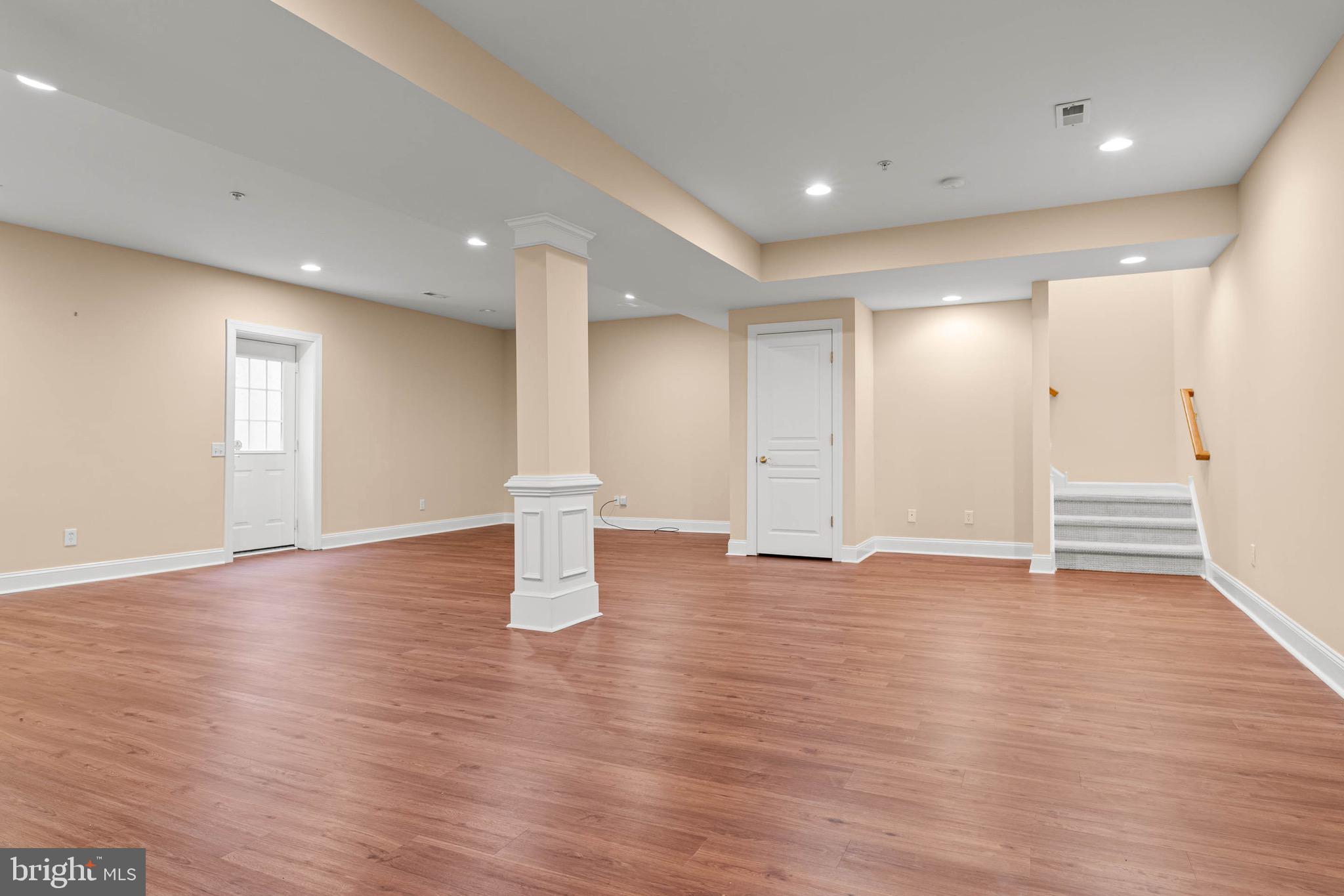302 Arthur Court Newtown Square, PA 19073 - Photo 49 of 57 Finished basement w/ outside stairs walkout.