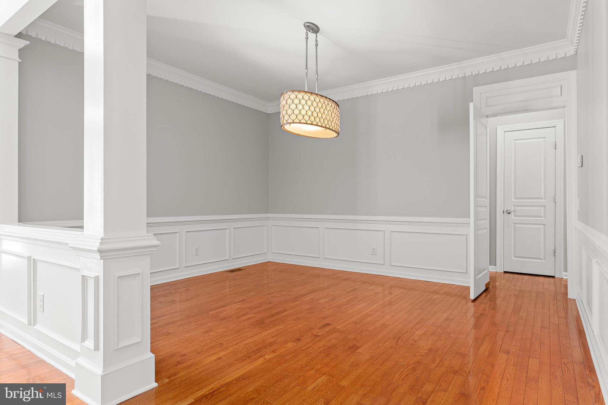 302 Arthur Court Newtown Square, PA 19073 - Photo 7 of 57 Dining room access to mudroom/laundry and kitchen.