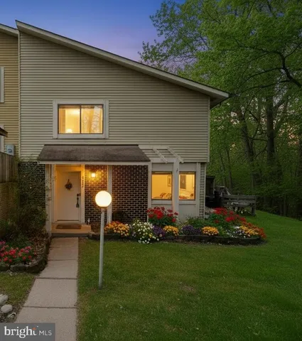 a front view of house with yard