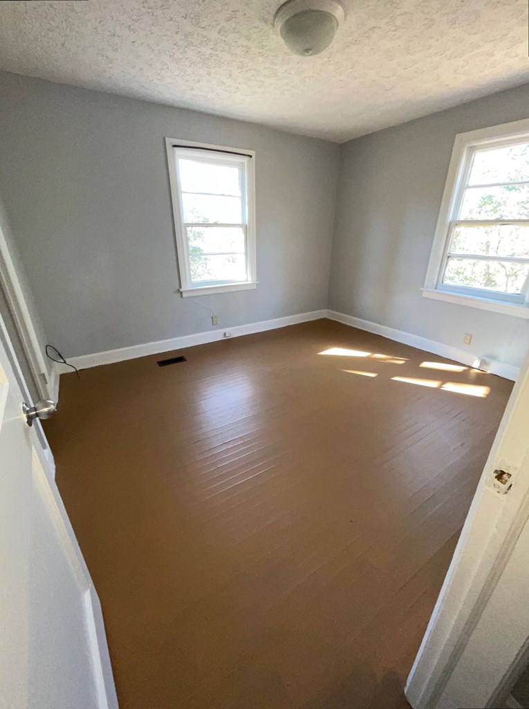48 Patton Drive Columbus, GA 31903 - Photo 3 of 11 an empty room with a window