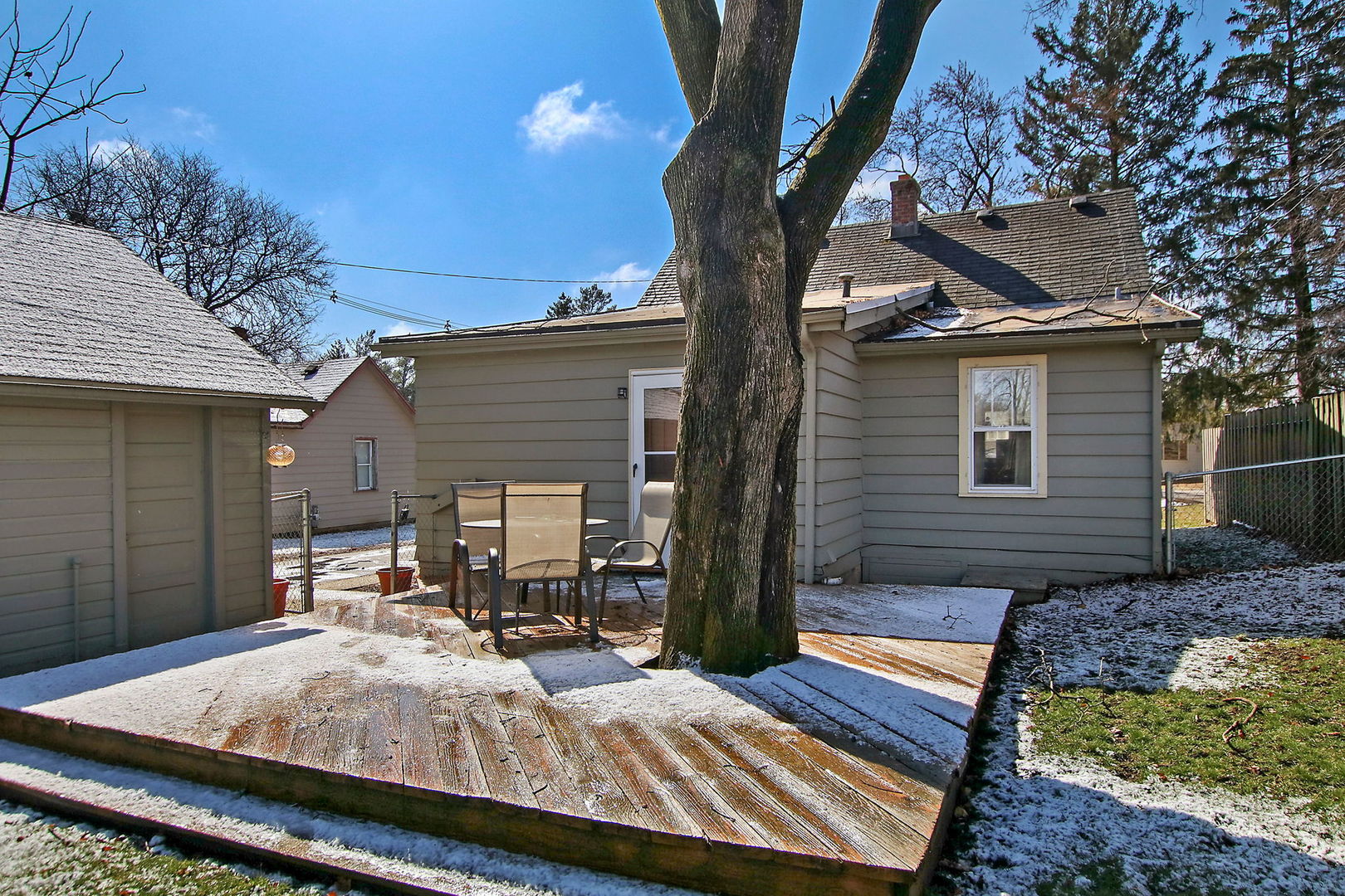 7608 Beaver Road Wonder Lake, IL 60097 - Photo 18 of 19 a view of a backyard with sitting area