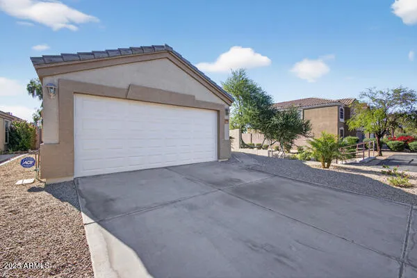 a view of a house with a street