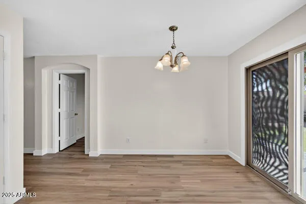 a view of a livingroom from a hallway