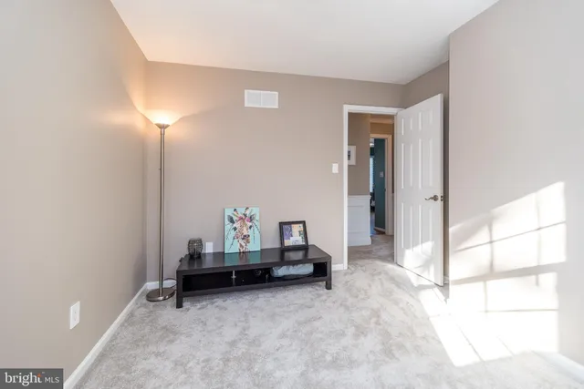 a view of a chairs and tables in the roof deck