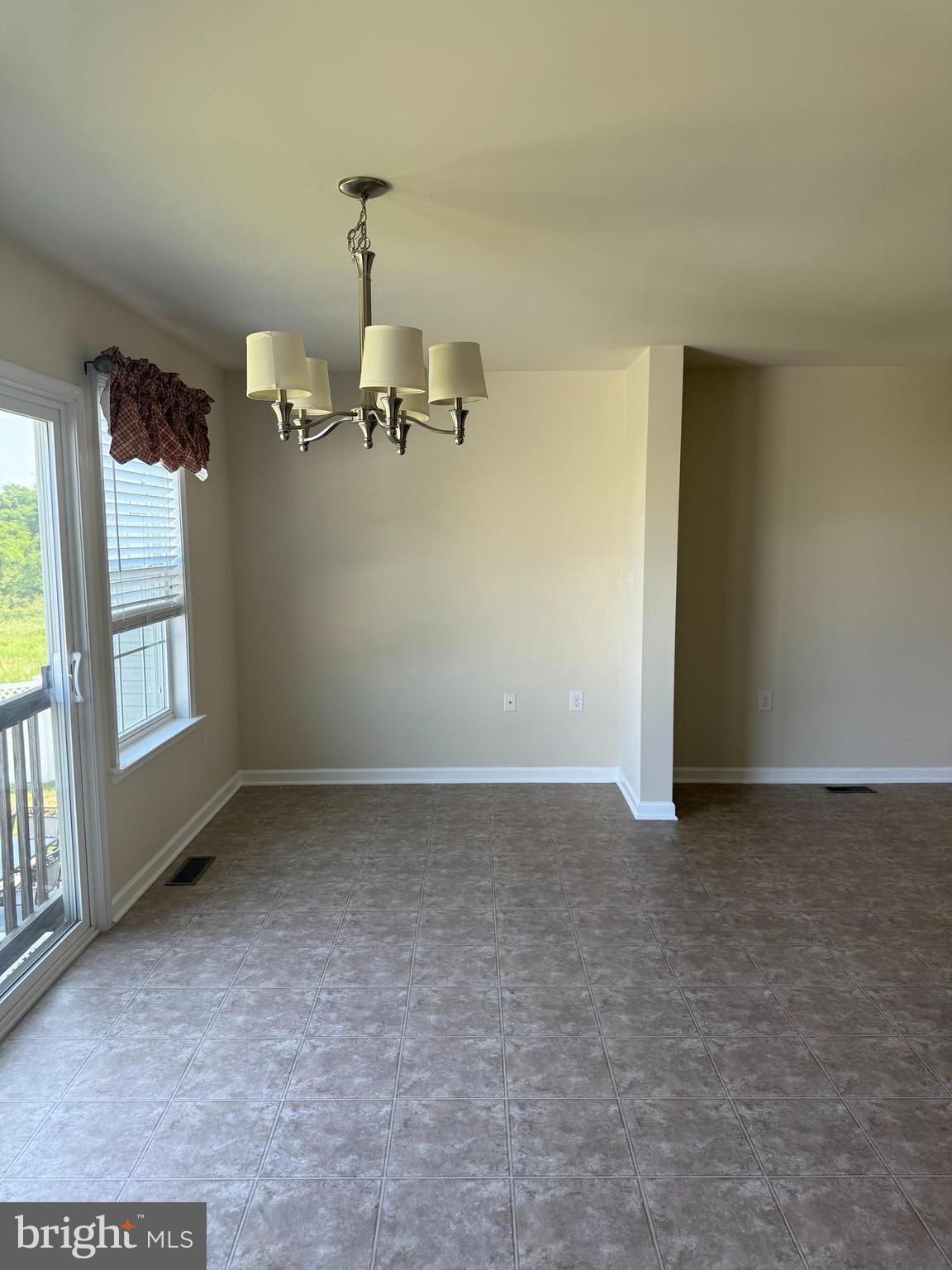 1130 Stallion Street Ranson, WV 25438 - Photo 6 of 24 an empty room with windows