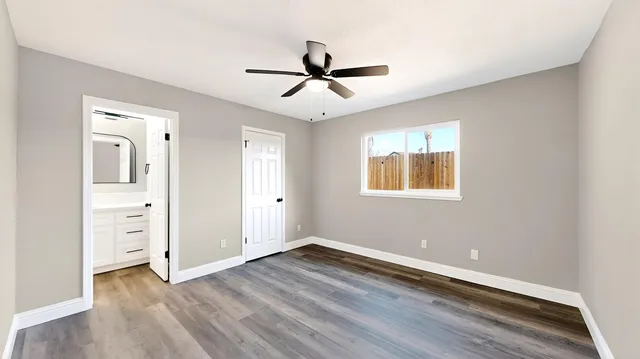 a bathroom with a sink a toilet and a shower