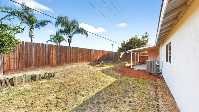 aerial view of a house with a garden
