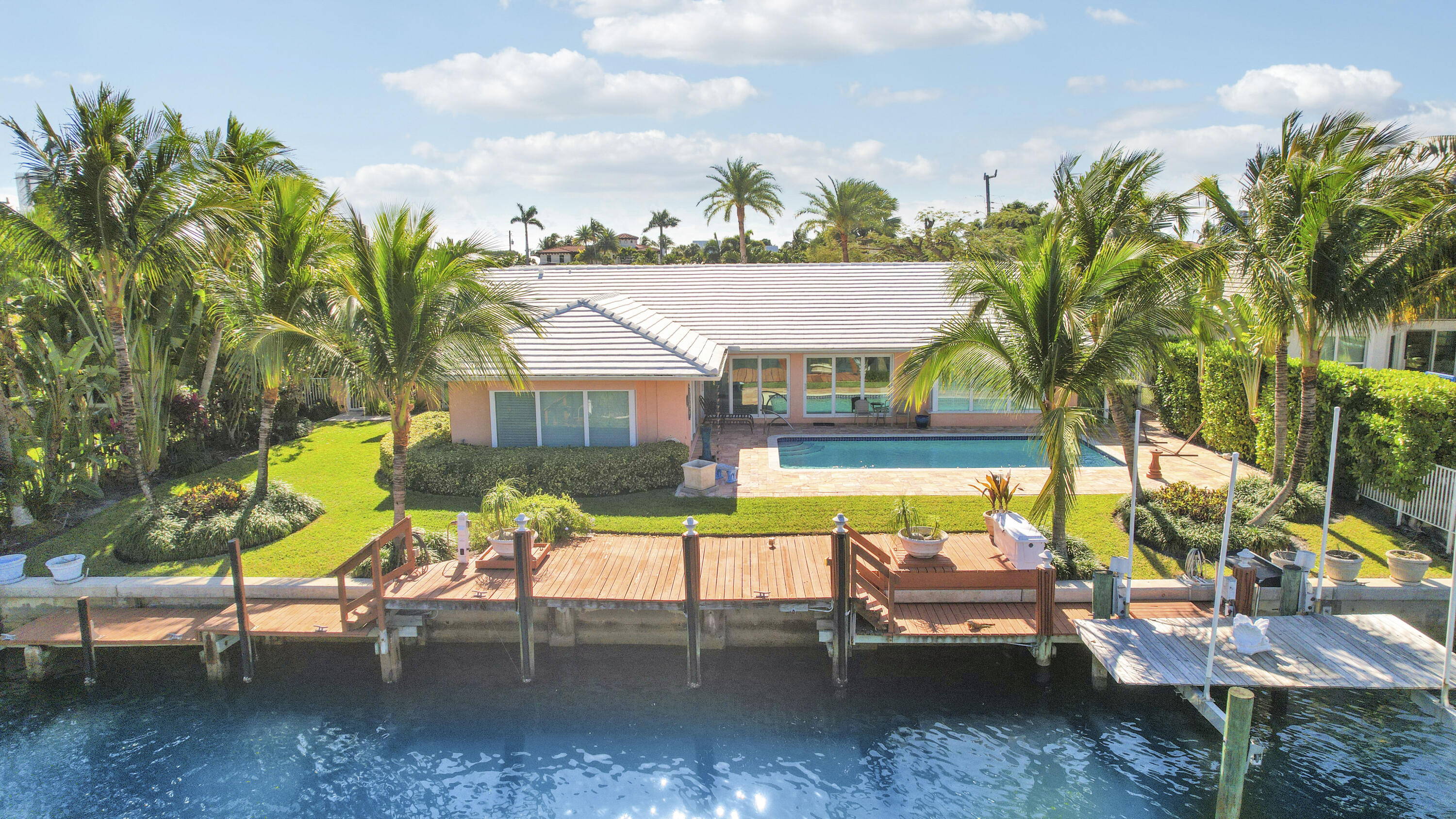 1080 Fairview Lane Singer Island, FL 33404 - Photo 1 of 51 an aerial view of a house with swimming pool garden and patio