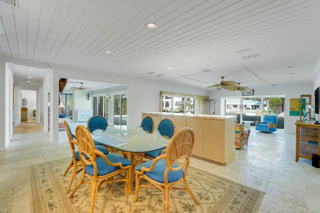 a dining room with furniture and a livingroom