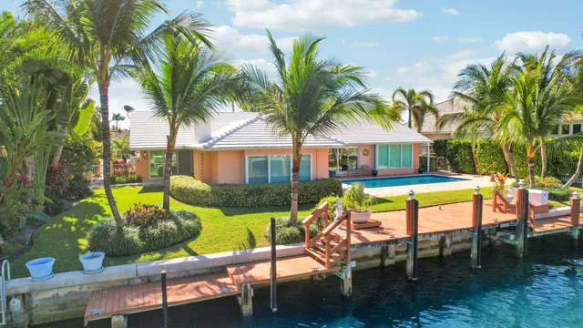a view of an chairs and table in the patio