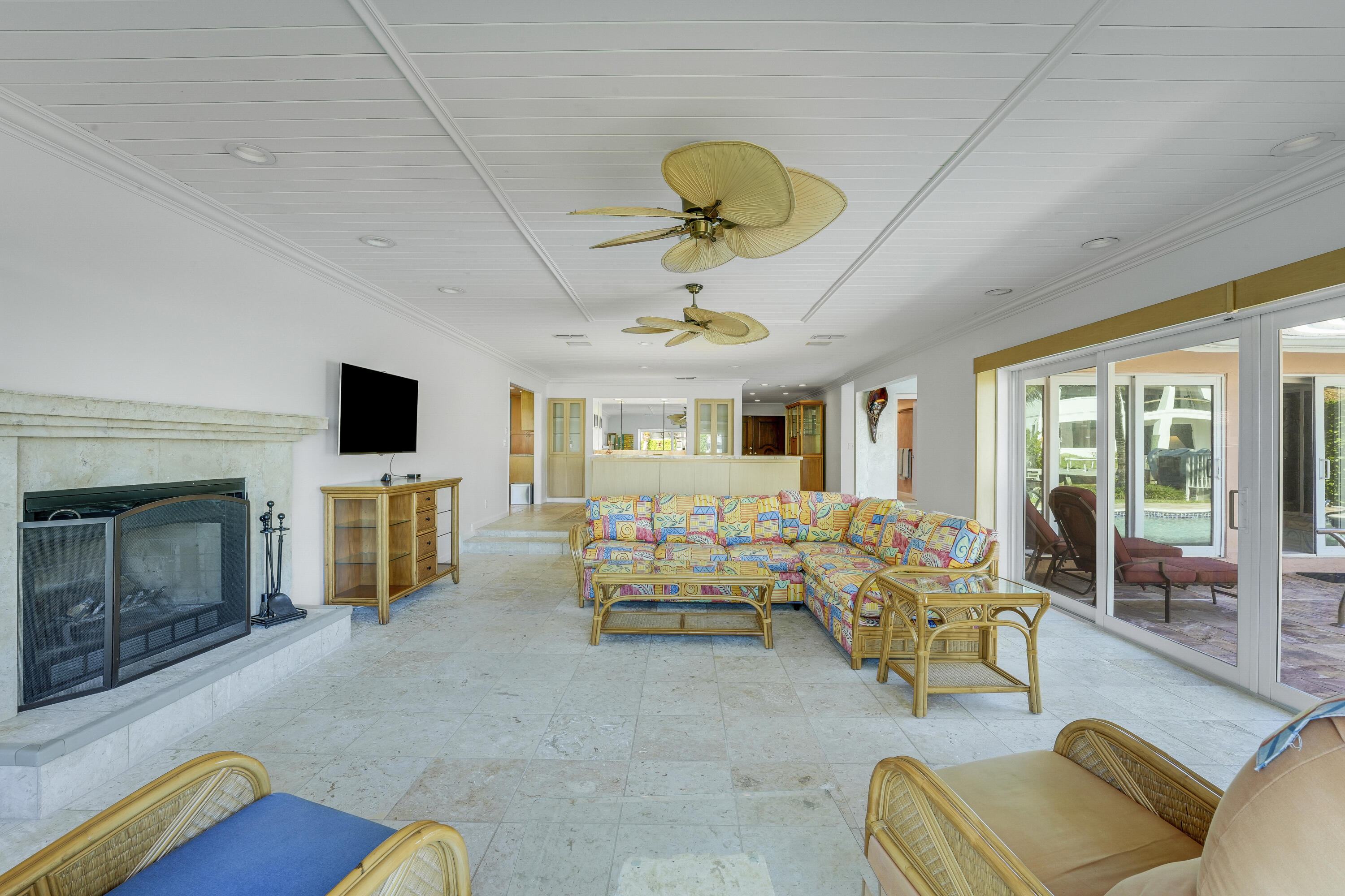 1080 Fairview Lane Singer Island, FL 33404 - Photo 24 of 51 a living room with furniture fireplace and flat screen tv