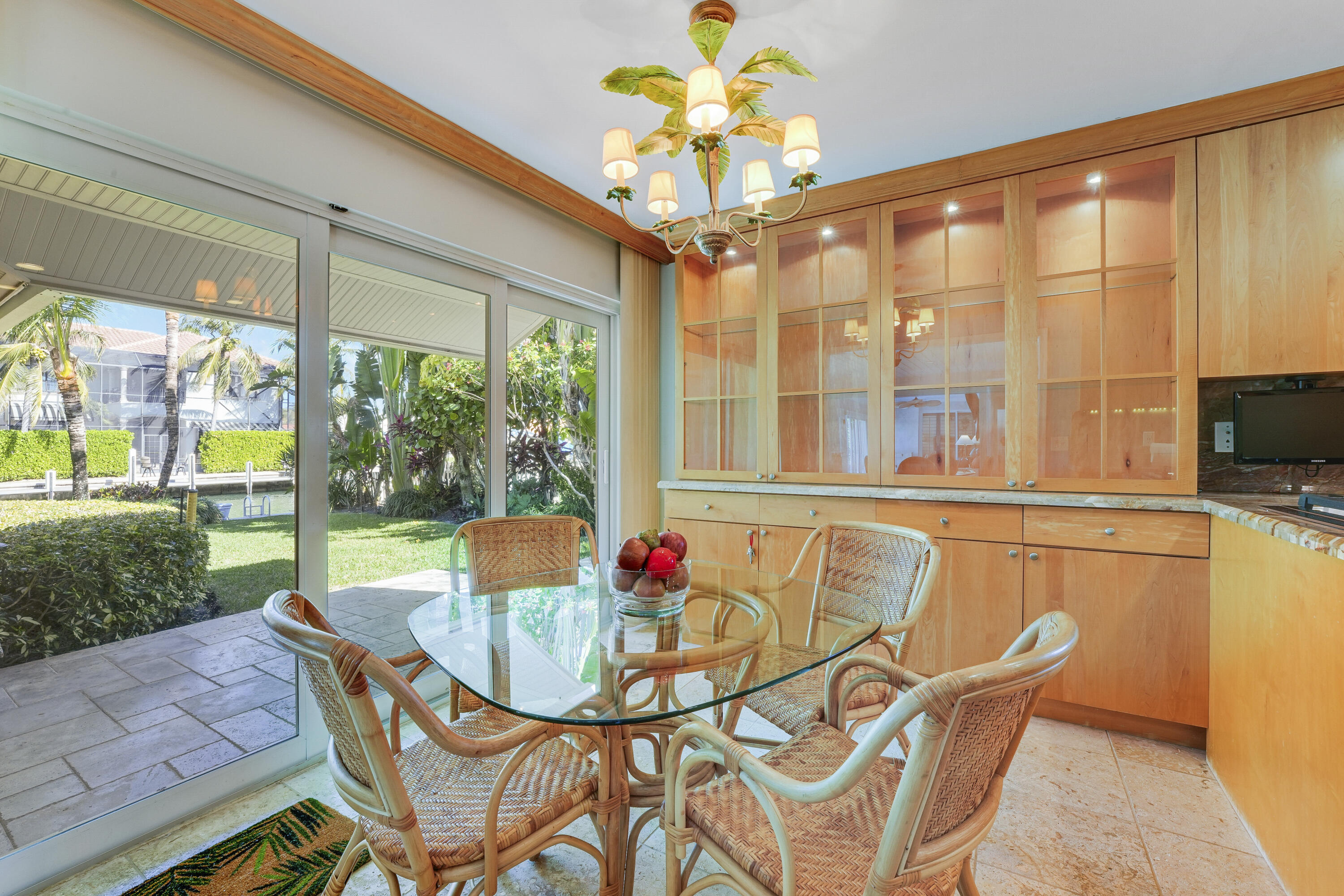 1080 Fairview Lane Singer Island, FL 33404 - Photo 25 of 51 a table that has a table and chairs in it