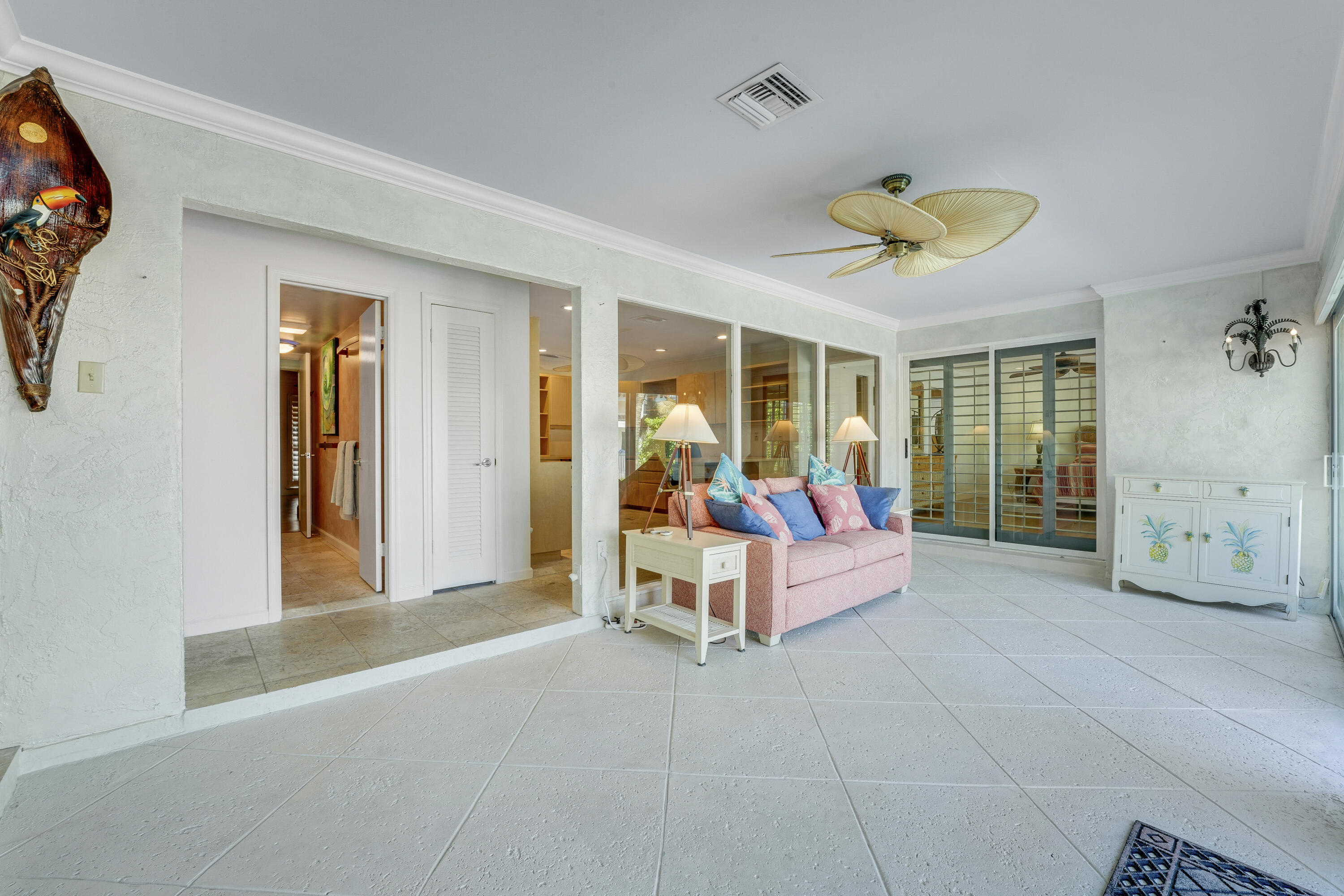 1080 Fairview Lane Singer Island, FL 33404 - Photo 31 of 51 a bed room with a bed and a chandelier