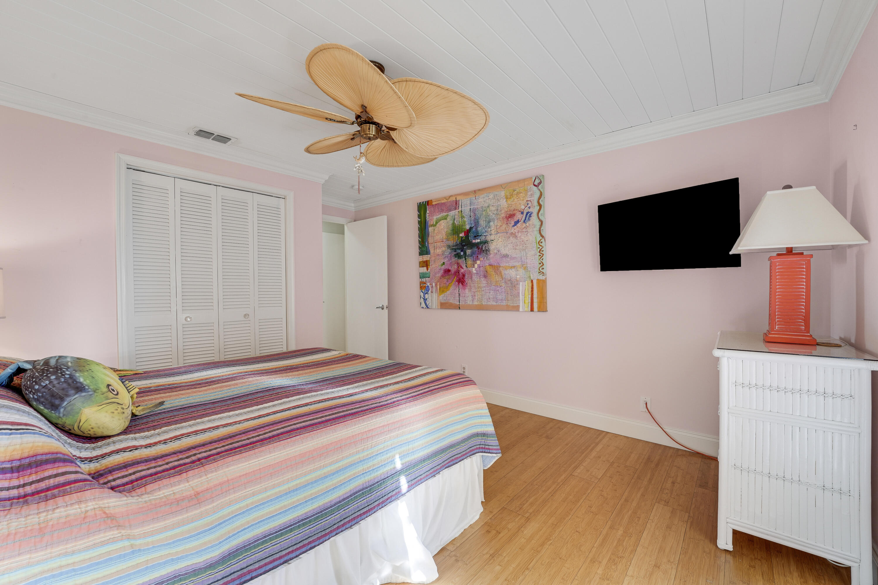 1080 Fairview Lane Singer Island, FL 33404 - Photo 37 of 51 a bedroom with a bed and a flat screen tv