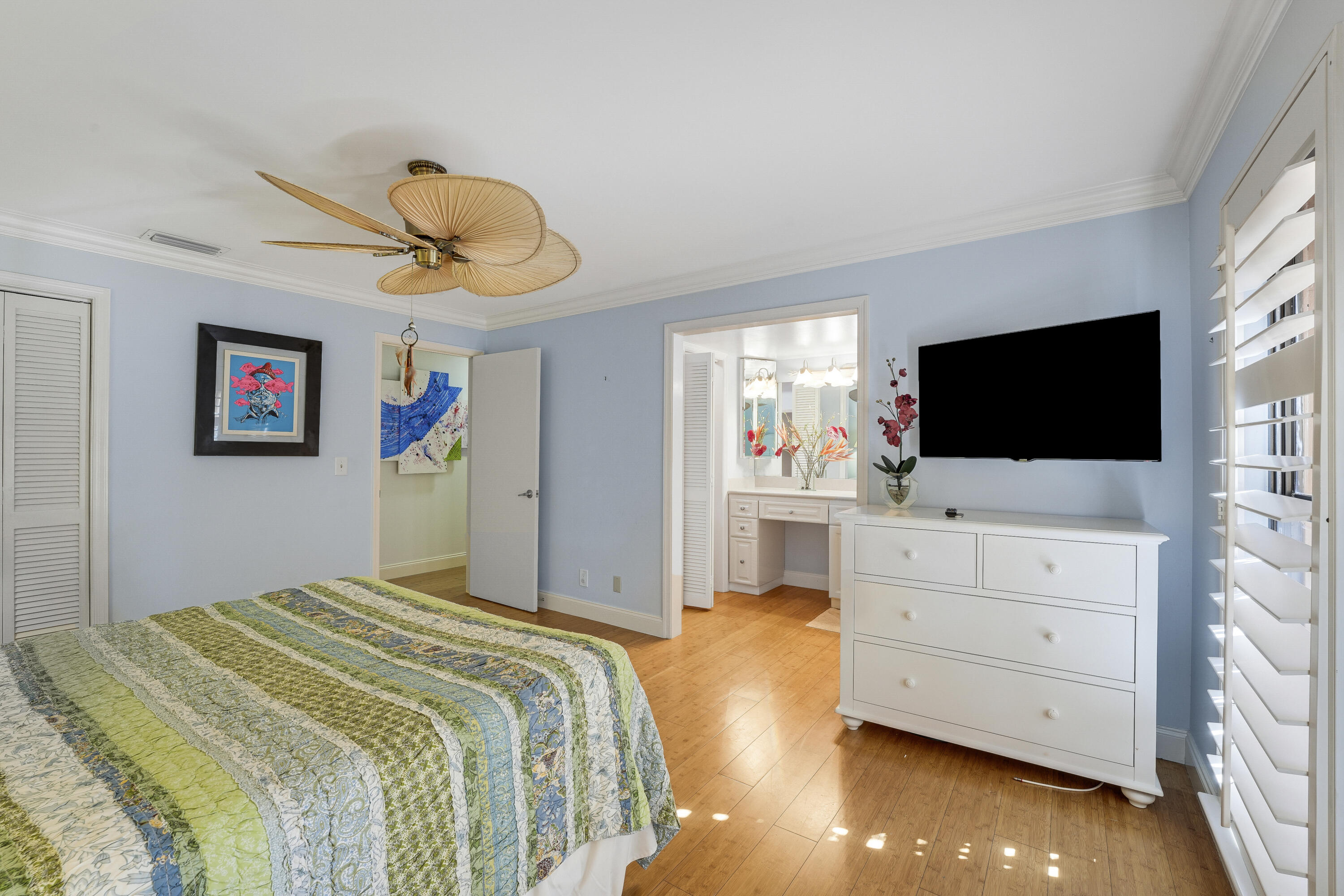 1080 Fairview Lane Singer Island, FL 33404 - Photo 40 of 51 a bedroom with a bed and flat screen tv