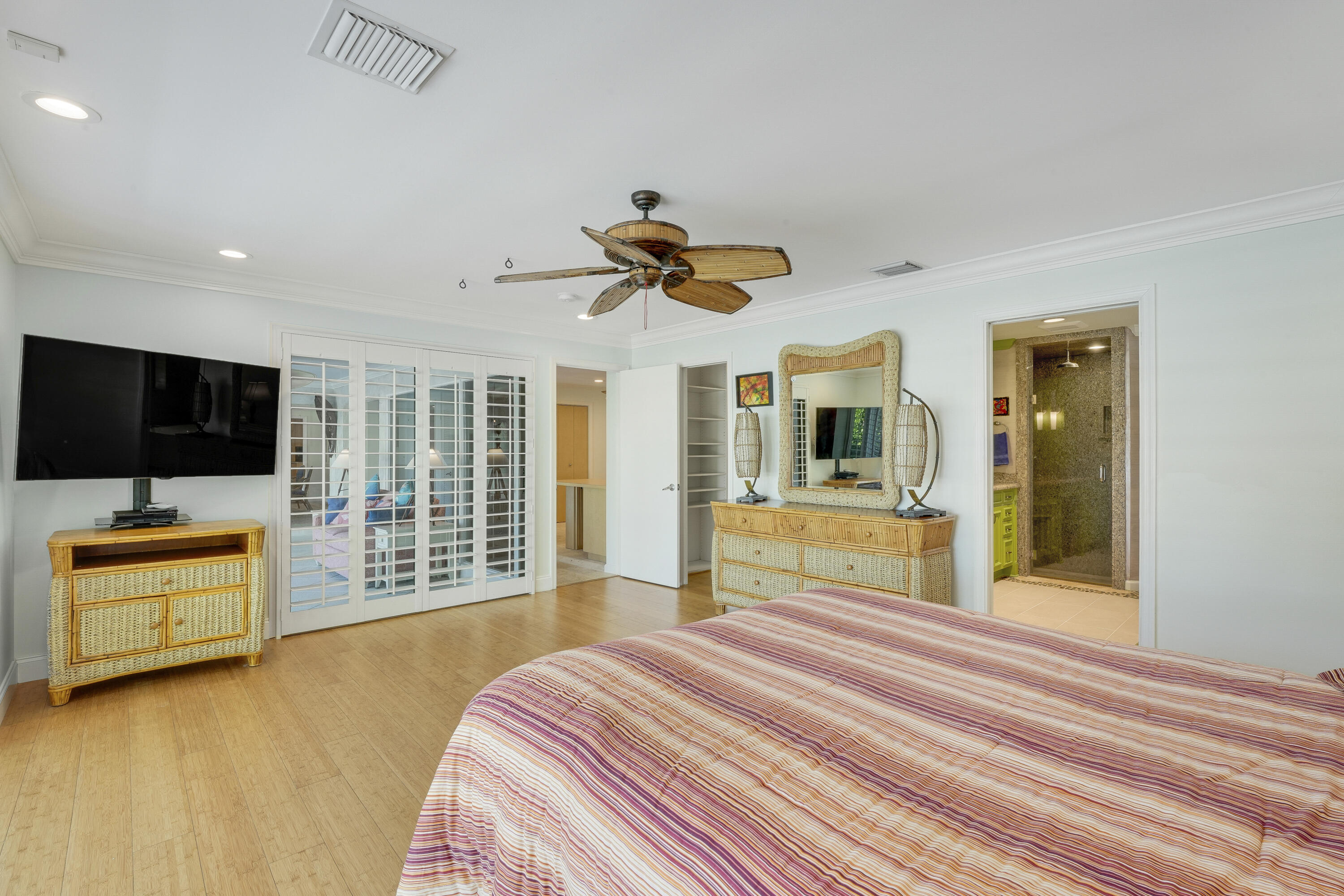 1080 Fairview Lane Singer Island, FL 33404 - Photo 45 of 51 a bedroom with a bed and a flat screen tv