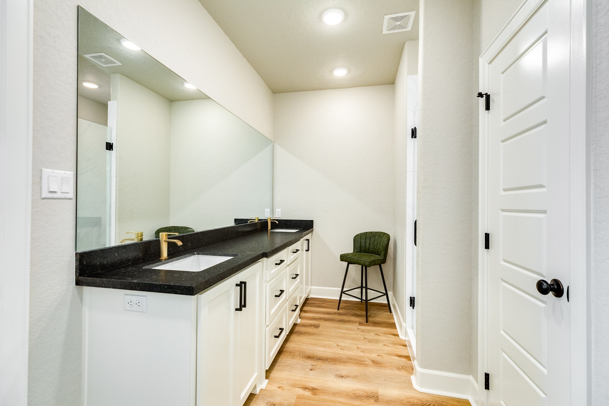 628 Greystone Lane Angleton, TX 77515 - Photo 23 of 33 a en suite bathroom with a granite countertop sink and a mirror
