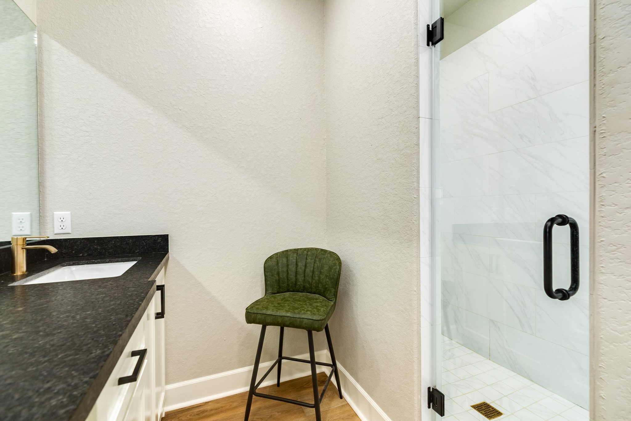 628 Greystone Lane Angleton, TX 77515 - Photo 25 of 33 a bathroom with a granite countertop sink a toilet and bathtub
