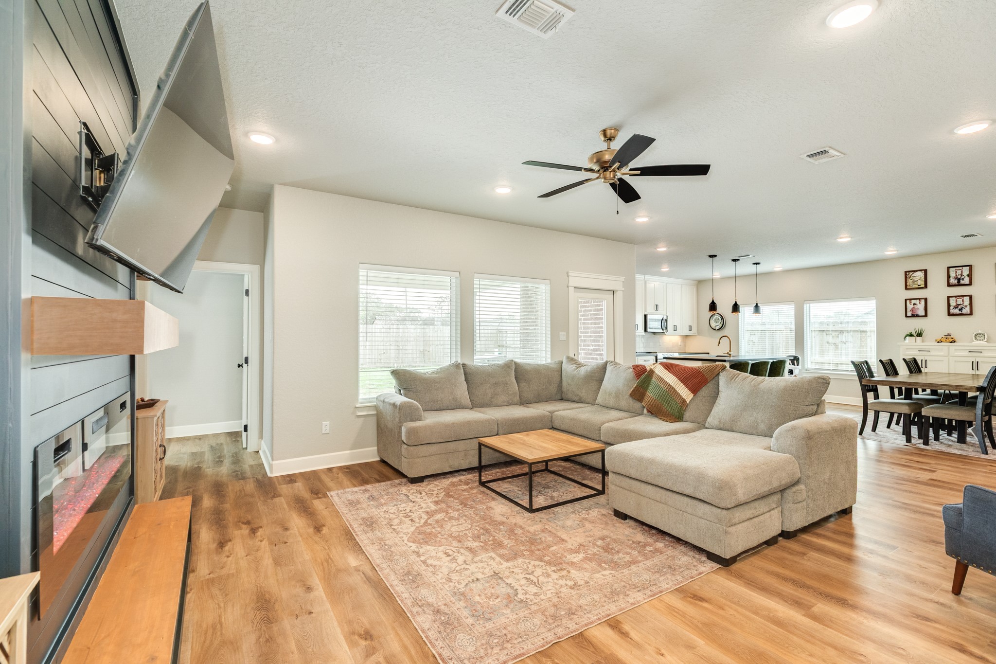 628 Greystone Lane Angleton, TX 77515 - Photo 8 of 33 a living room with furniture and a large window