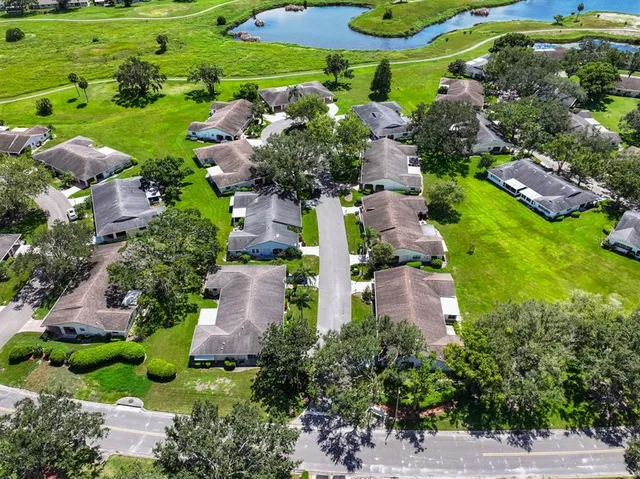 an aerial view of a house with a garden